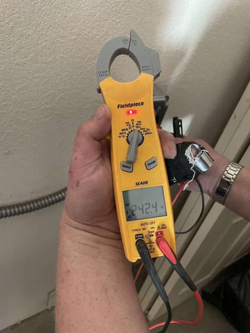 Voltage testing with clamp meter during Generator Installation in Marathon